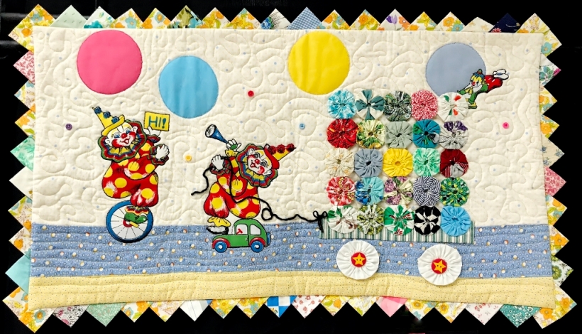 Art quilt depicting circus theme.